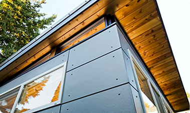 Modern shed corner with black exterior panels
