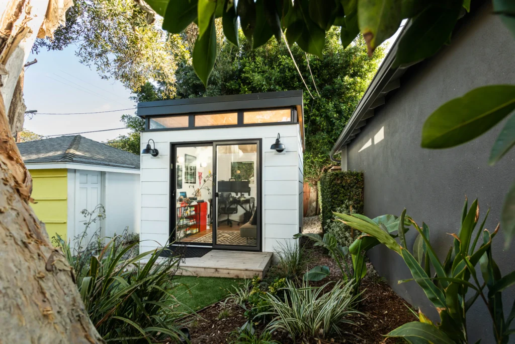 Small modern home office shed with sliding glass doors